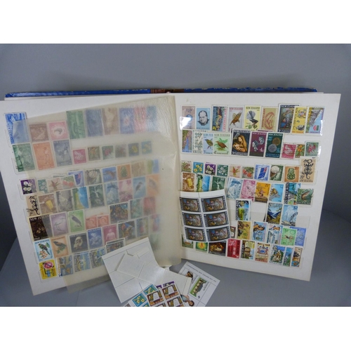 688 - Three stamp albums, two Stanley Gibbons Silver Jubilee and an album containing New Zealand and Newfo... 