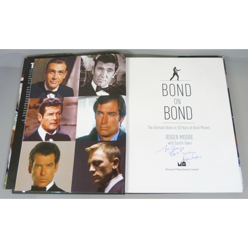 696 - James Bond; Roger Moore autographed book