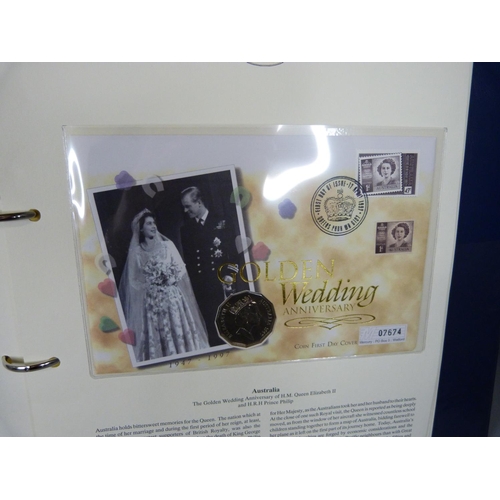 704 - An album of Royal Family commemorative coin covers