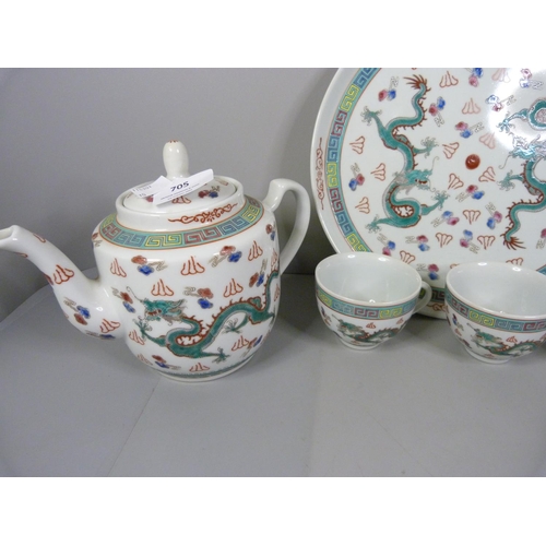 705 - A Chinese hand painted tea set