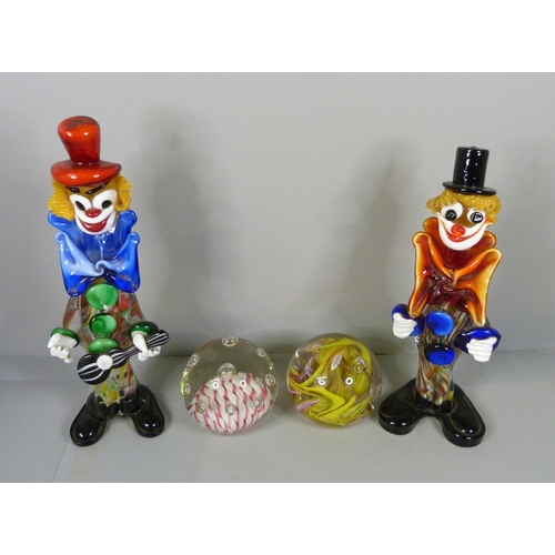 707 - Two Murano glass clowns and two glass paperweights