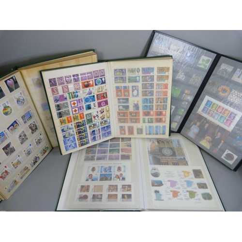 709 - Four albums of stamps including some sheets