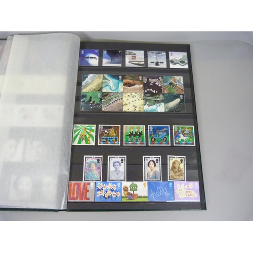 709 - Four albums of stamps including some sheets