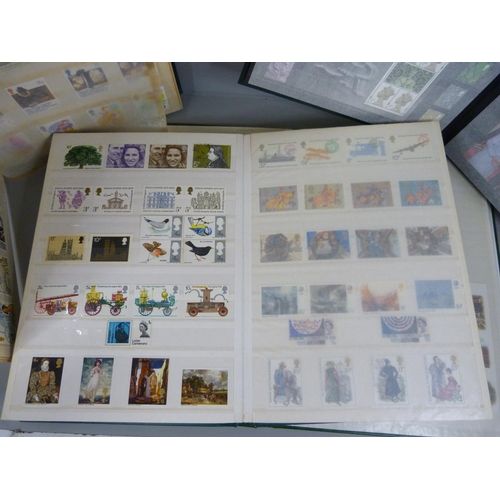 709 - Four albums of stamps including some sheets