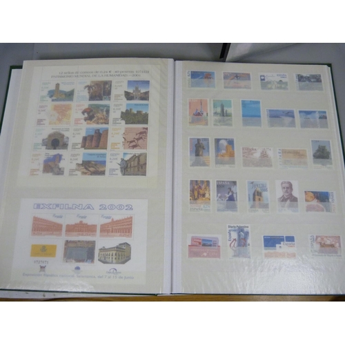 709 - Four albums of stamps including some sheets