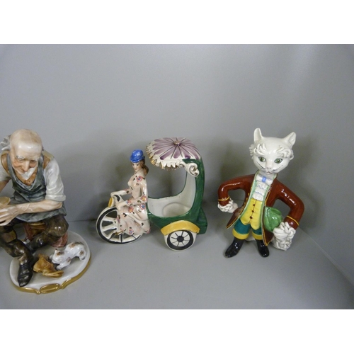 727 - A collection of Italian figures including a pair of comical cat figures, some a/f to the cats