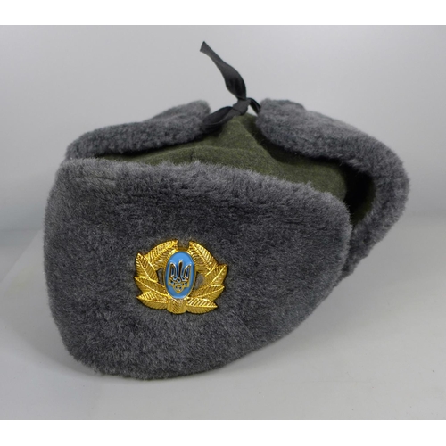 763 - A Ushanka hat with Ukraine badge