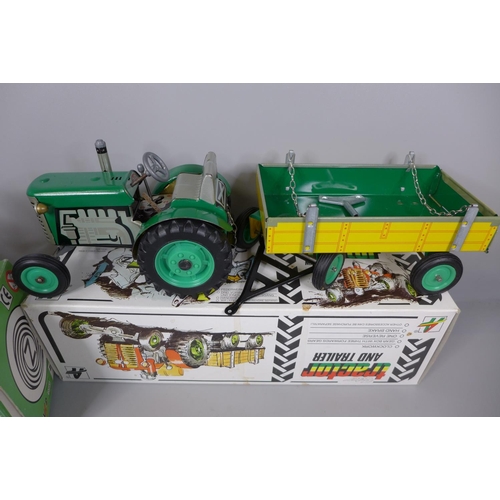 779 - Two tin-plate wind-up models of tractors, both Kovap, boxed