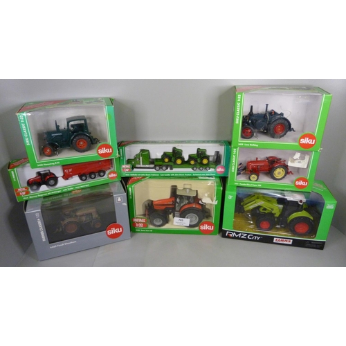 785 - Eight Siku die-cast model tractors, boxed