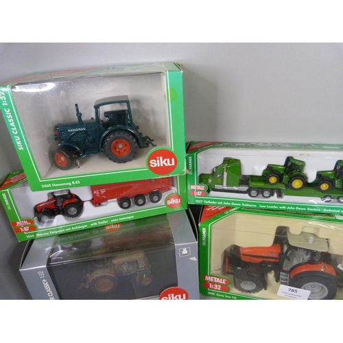 785 - Eight Siku die-cast model tractors, boxed