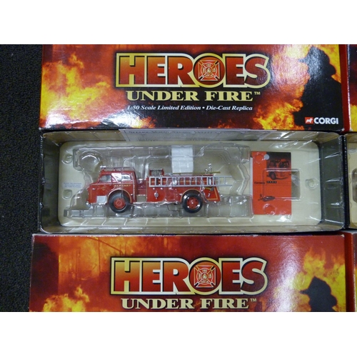 792 - Four Heroes Under Fire Corgi die-cast model vehicles, one in associated box