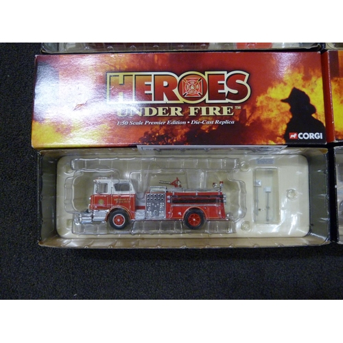 792 - Four Heroes Under Fire Corgi die-cast model vehicles, one in associated box