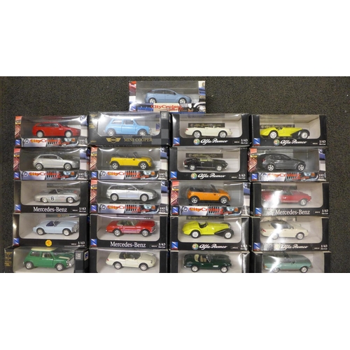 809 - A collection of die-cast model vehicles, New Ray sports cars, etc., boxed (33)