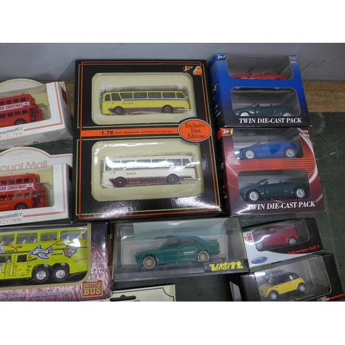 814 - A collection of thirty mixed die-cast model vehicles, boxed