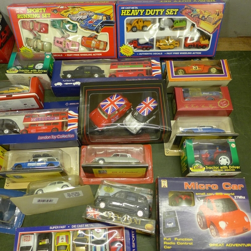 817 - A collection of approximately forty mixed die-cast model vehicles including twelve Saico, boxed