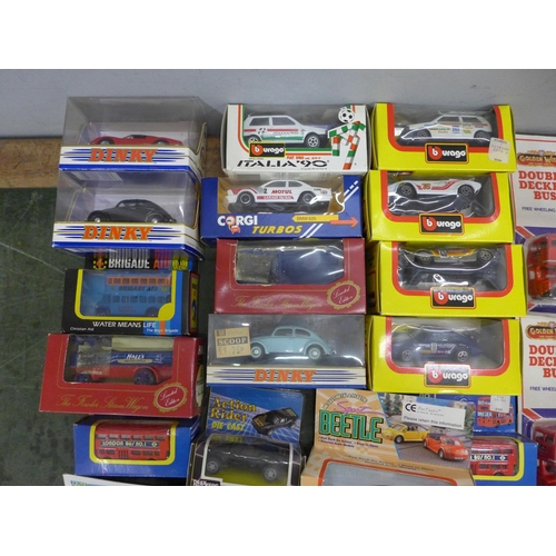 820 - A box of twenty-six mixed die-cast model vehicles including Burago and Dinky