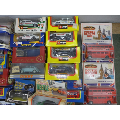 820 - A box of twenty-six mixed die-cast model vehicles including Burago and Dinky