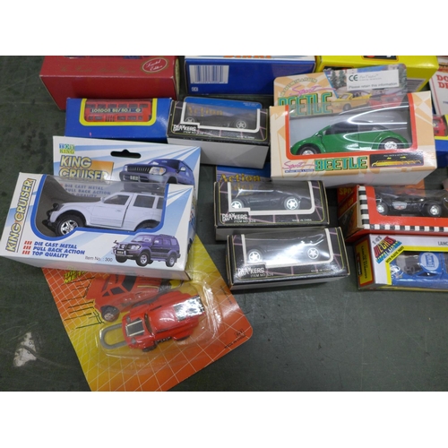 820 - A box of twenty-six mixed die-cast model vehicles including Burago and Dinky