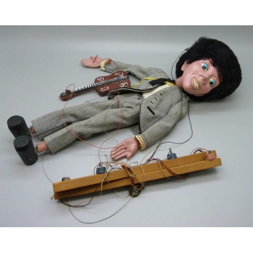 870 - A Beatles Pelham puppet, George Harrison