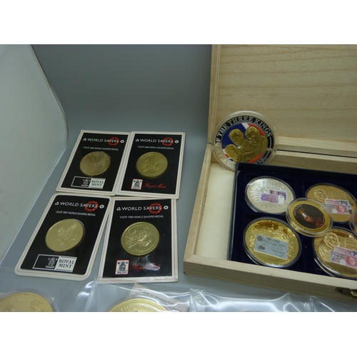 955 - A collection of commemorative medallions and Royal Mint World Savers coins