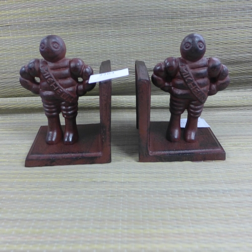 2408 - Cast metal Michelin Man bookends * this lot is subject to VAT