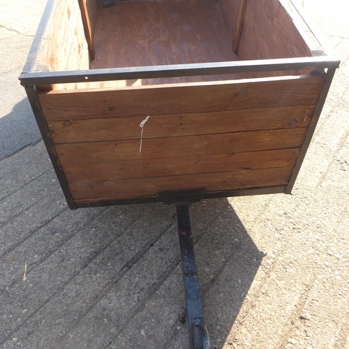 2416 - 7' x 3' Metal and wood trailer. Selling at 12 noon on auction day