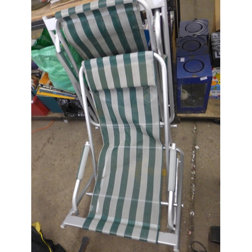 2098 - 2 folding swing deck chairs