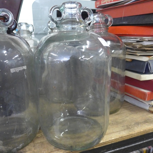 2105 - Eleven glass demijohns