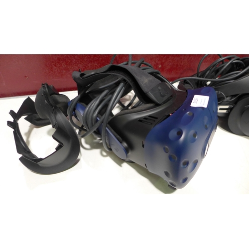 3136 - 3 Vive headset units * this lot is subject to VAT