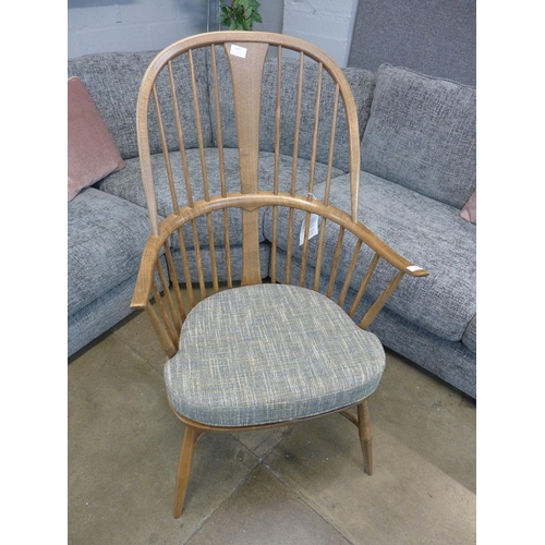 1313 - An Ercol arm chair with upholstered cushion * this lot is subject to VAT