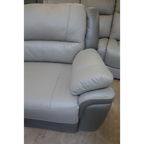 1419 - A two tone grey leather electric reclining three and a static two seater sofa * this lot is subject ... 