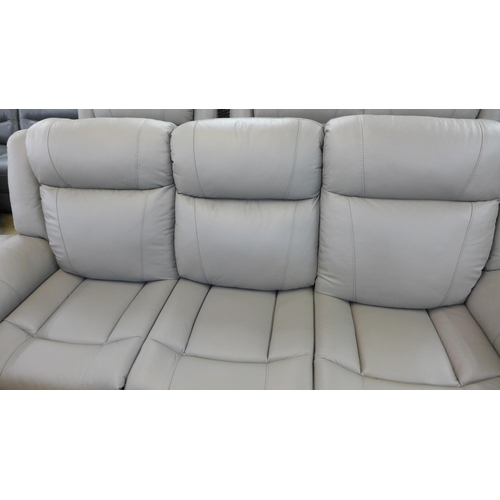 1420 - A grey leather three seater/cinema sofa and a two seater and armchair with footstool * this lot is s... 