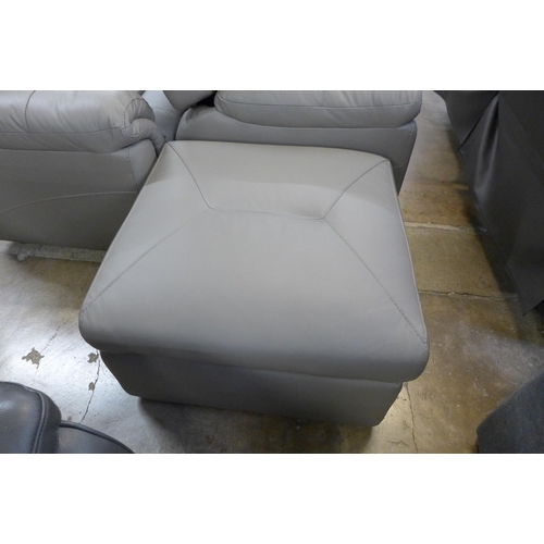 1420 - A grey leather three seater/cinema sofa and a two seater and armchair with footstool * this lot is s... 