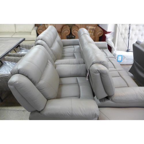 1420 - A grey leather three seater/cinema sofa and a two seater and armchair with footstool * this lot is s... 