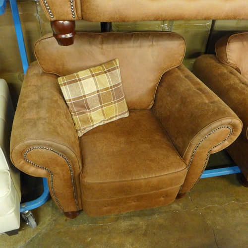 1421 - A County tan upholstered four seater sofa and a pair of armchairs * this lot is subject to VAT