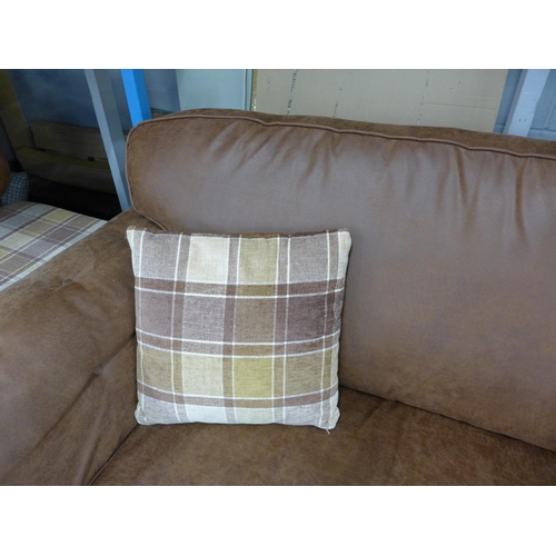 1474 - A County tan upholstered and studded love seat* this lot is subject to VAT