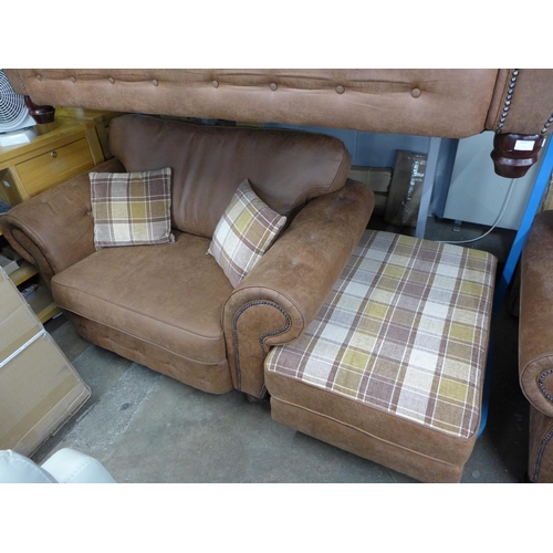 1474 - A County tan upholstered and studded love seat* this lot is subject to VAT