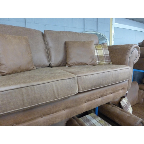 1474 - A County tan upholstered and studded love seat* this lot is subject to VAT