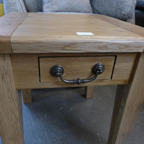 1489 - An oak lamp table * this lot is subject to VAT