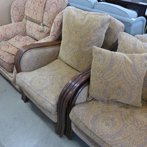 1537 - A rattan and paisley upholstered 3.5 seater sofa, chair and footstool, a rattan and leather side cha... 