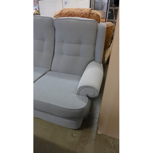 1547 - A light blue three seater sofa, armchair and side chair