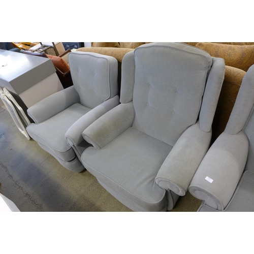 1547 - A light blue three seater sofa, armchair and side chair