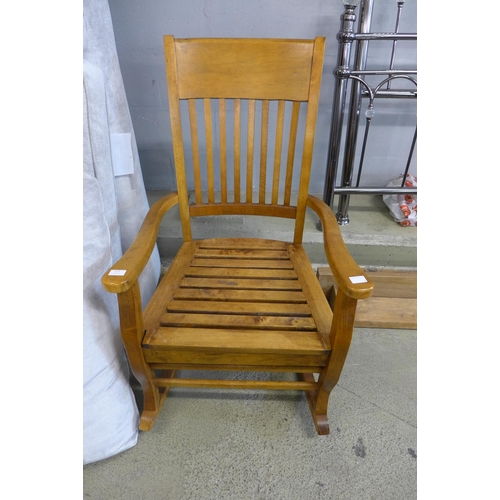 1576 - A beech rocking chair and a pine wall shelf