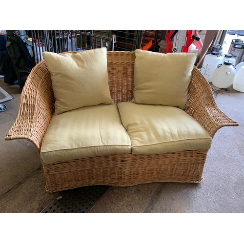 2353a - Wicker 2 seater sofa with green cushions