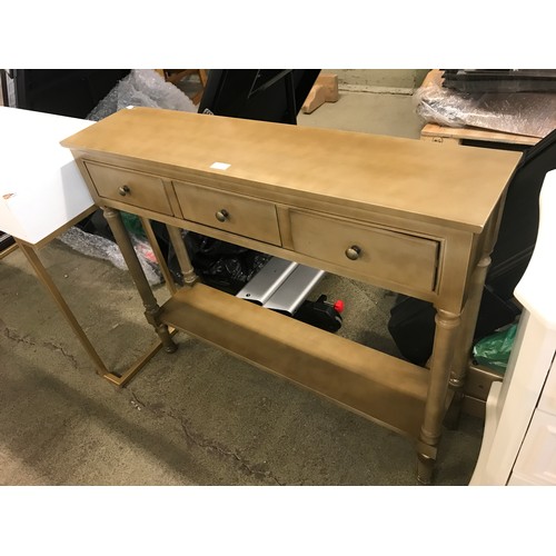 1557 - An olive three drawer console table