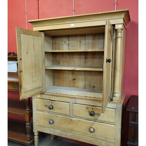 18 - A George III pine housekeeper's cupboard, 199cms h, 123cms w, 54cms d