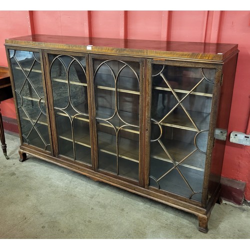 2 - An Edward VII  Maple & Co. mahogany and astragal glazed four door bookcase, 119cms h, 185cms w, 41cm... 