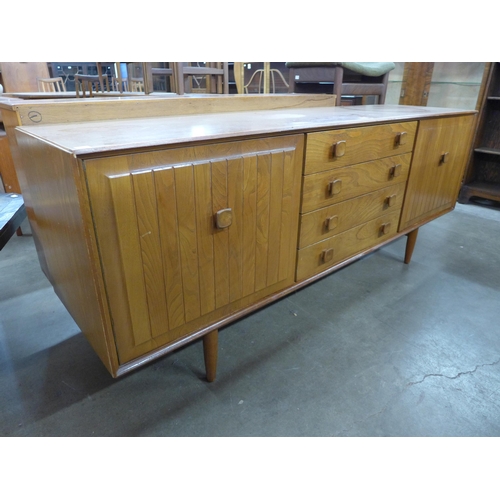 78 - An Ensign teak and elm sideboard, by Bristow & Townsend