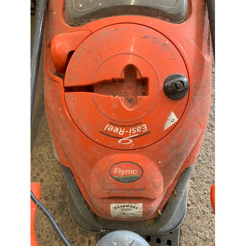 2121 - A Flymo Vision Compact 380 mower with easy-reel & tangle-free cable storage