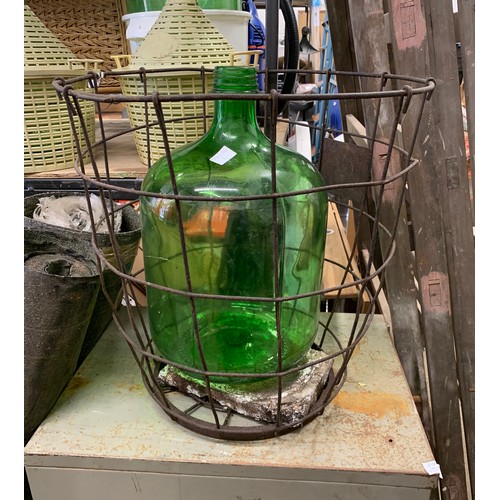 2124 - Green glass carboy jar in steel cage